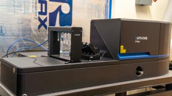 Lumicks C-Trap instrument integrating optical tweezers, microscopy, and microfluidics in a laboratory setting.